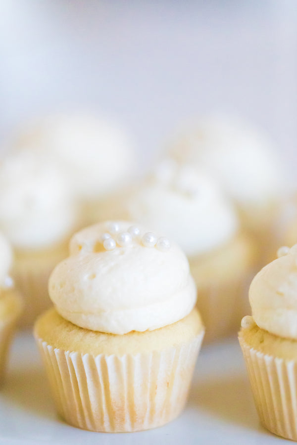 Mini vanilla cream cupcakes